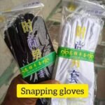 Black gloves used to take pictures - Image 2