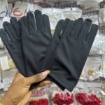 Black gloves used to take pictures