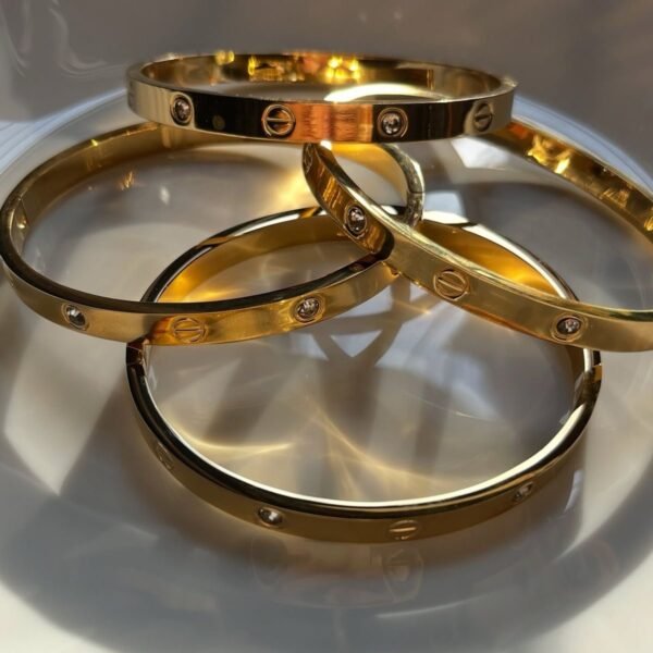Cartier Style Nail Bangle Bracelet luxury inspired gold plated wrist accessory available at June Jewels Nigeria