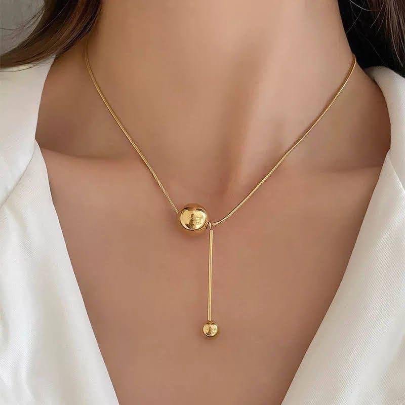 a22a9af8-dc5a-4322-9848-0236908025e5-2 Dropping ball necklace - Image 1